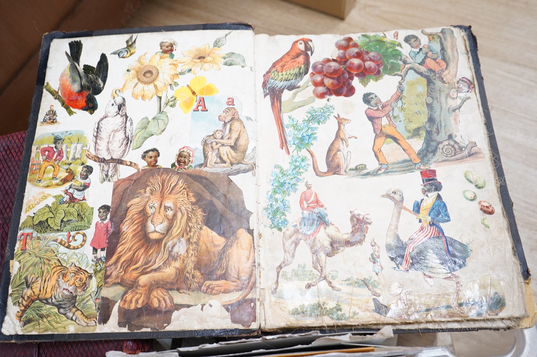 A collection of sundry items to include a scrapbook and a large collection of various stamps
